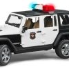 Bruder Jeep Wrangler Unlimited Rubicon Polizeifahrzeug mit Polizist und Ausstattung Modellfahrzeuge